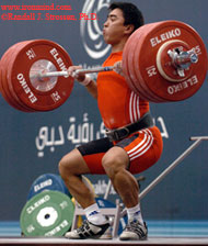 Ulanbek Moldodosov (Kyrgyzstan) pulls himself under 190 kilos, en route to winning the 85-kg category at the Asian Weightlifting Championships earlier today in Dubai. IronMind® | Randall J. Strossen, Ph.D. photo.