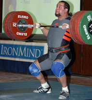 Robert Murphy going under his 200-kg clean, on his way to winning the men's 94-kg title. IronMind® | Randall J. Strossen, Ph.D. photo.