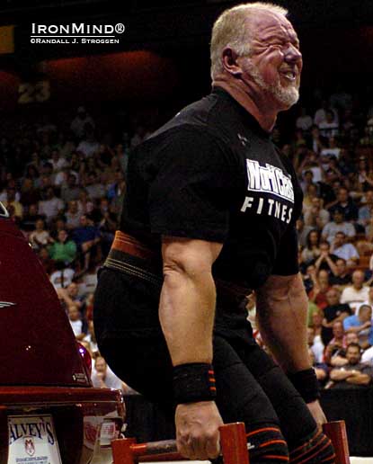 Odd Haugen shown on the Car Deadlift at the 2006 Mohegan Sun.  Haugen, an able strongman competitor and huge fight fan, also has a ferocious grip, and he has been a pioneer in recognizing and promoting grip contests on a par with other strength events.  No wonder that the Odd Haugen Strength Classic showcases strongman, mas wrestling and grip strength—all under one roof.  IronMind® | Randall J. Strossen photo