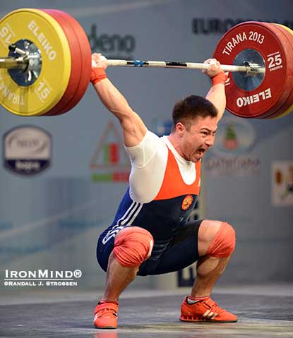 Oleg Chen (Russia) on the way up with his 155-kg snatch, a lift that would give him his go-head margin for the gold medal in the total as well.  IronMind® | Randall J. Strossen photo. 