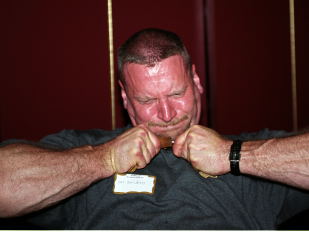 It wasn't lack of effort that kept Pat Povilaitis from polishing off an IronMind Red Nail at the 2002 AOBS dinner. IronMind® | Randall J. Strossen, Ph.D. photo.
