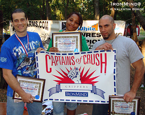 Shown at the award ceremony are the the winners of the Captain’s of Crush® Queensboro Strongest Arms are (left to right) Jason Vale (Belleros, NY), Mirline Berrouet (So. Ozone Park, NY) and Mike Selearis (Elmhurst, NY).  IronMind® | Valentin Boros photo/courtesy of Gene Camp/NYAWA.