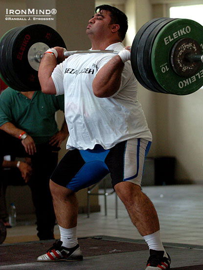 Two-time Olympic gold medalist Hossein Rezazadeh made a 200-kg power clean look light as a feather in the training hall at the 2006 World Weightlifting Championships (Santo Domingo, Dominican Republic).  IronMind® | Randall J. Strossen photo.