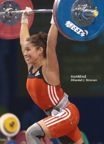 Melanie Roach (USA) went six for six this afternoon at the World Weightlifting Championships, outdoing her performance ten years and three children ago, proving that getting better, not just older, really can happen. IronMind® | Randall J. Strossen, Ph.D. photo.