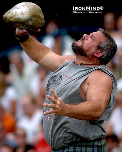 Along with Braemar Games champion Francis Brebner, five-time Highland Games world champion Ryan Vierra (shown on the Braemar stone at Fergus ’05) will be sharing throwing secrets at a seminar in Hungary this summer.  IronMind® | Randall J. Strossen photo. 