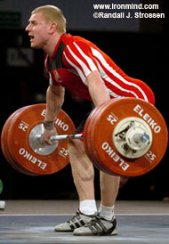 On its way: 85-kg competitor Andrei Rybakou (Belarus) launches 186 kg, good for a new world record in the snatch. IronMind® | Randall J. Strossen, Ph.D. photo.