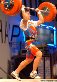 Sa Jae-Hyuk drives himself under the 179-kg jerk that gave him the gold medals in the both the clean and jerk, and the total. IronMind® | Randall J. Strossen, Ph.D. photo.