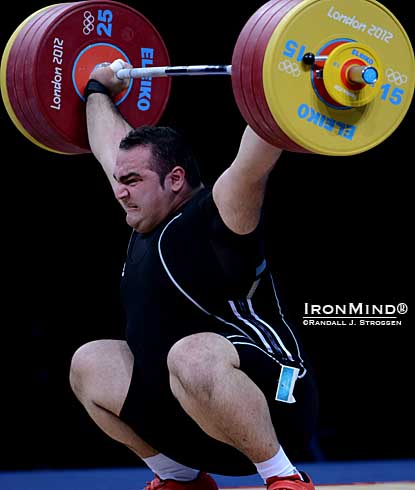 Behdad Salimi nailed this 208-kg snatch on his third attempt.  IronMind® | Randall J. Strossen photo.
