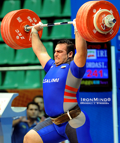 Even if Behdad Salimi (Iran) had managed to straighten out his arms again and hold the bar overhead, this jerk would have been red lighted for press-out.  IronMind® | Randall J. Strossen photo.