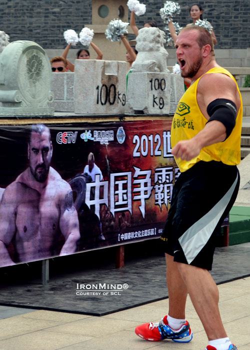 Travis Ortmayer celebrates winning the Loading event.  IronMind® | Courtesy of SCL.