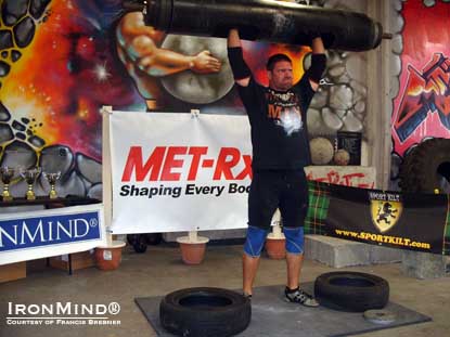 Scott Brengel on the log at the IHGF Beach Cities Strongest Man contest.  IronMind® | Photo courtesy of Francis Brebner.