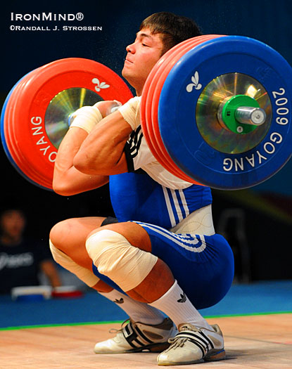 Vladimir Sedov hits the bottom with 217-kg on his way to winning the 94-kg category at the World Weightlifting Championships.  IronMind® | Randall J. Strossen photo.