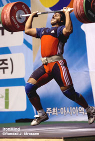 Reza Teimouri (Iran) flies under 200 kg as he won all three gold medals in the 105-kg category at the Asian Junior Weightlifting Championships in Gunsan, Korea. IronMind® | Randall J. Strossen, Ph.D. photo.