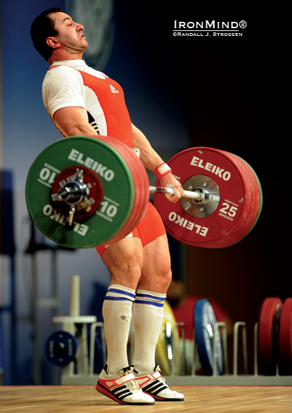 Rauli Tsirekidze cranks on 200 kg: He went six-for-six, winning the silver medal in the snatch and jerk, and the gold in the total in the 85-kg category at the 2012 European Weightlifting Championships.  IronMind® | Randall J. Strossen photo.