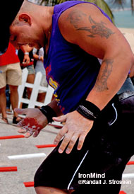 Raivis Vidzis finished the power stairs with badly ripped calluses and a very bloodly hand, but he taped up and went on the next event. IronMind® | Randall J. Strossen, Ph.D. photo.