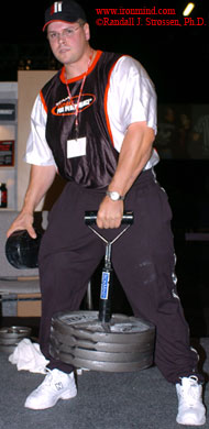 Wade Gillingham does an easy (for him) double at the GNC Grip Gauntlet at the 2004 Show of Strength (Atlanta, Georgia). Come on Wade, at least pretend it's hard to do. IronMind® | Randall J. Strossen, Ph.D. photo.