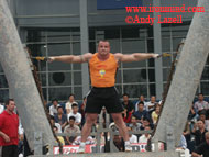 Mariusz Pudzianowski on the Pillars of Hercules in the 2005 MET-Rx World's Strongest Man contest. This dramatic event, along with Fingal Fingers, is on the schedule for tomorrow. IronMind® | Photo courtesy of Andy Lazell.