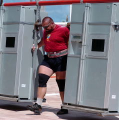 Vasyl Virastiuk motors down the course in the refrigerator race. IronMind® | Randall J. Strossen, Ph.D. photo.