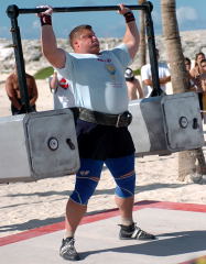 Zydrunas Savickas, pushing hard on the Safe Lift, at WSM 2004. IronMind® | Randall J. Strossen, Ph.D. photo.