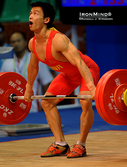 Wu Jingbiao is about to pop this 133-kg snatch, good for a new Asian and new Asian Games record.  IronMind® | Randall J. Strossen photo.