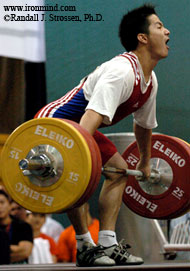 69-kg Yao Yuewei (China) lays it on this 156-kg Junior World Record snatch at the Asian Weightlifting Championships. IronMind® | Randall J. Strossen, Ph.D. photo.