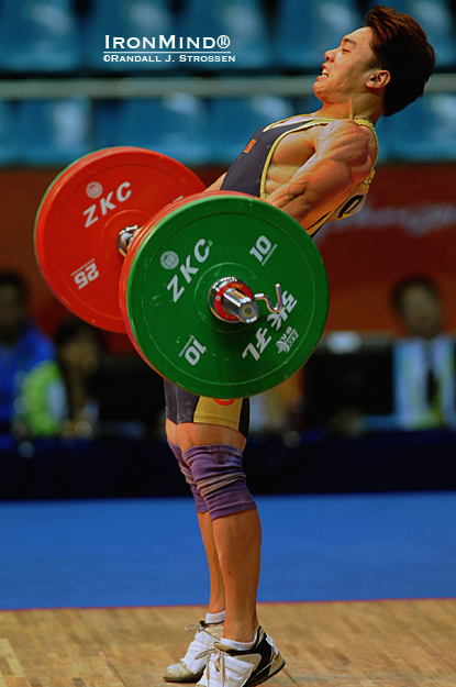 Ripped and ready, Zhang Jie won the gold medal in the men’s 53-kg category at the Asian Games tonight.  IronMind® | Randall J. Strossen photo.