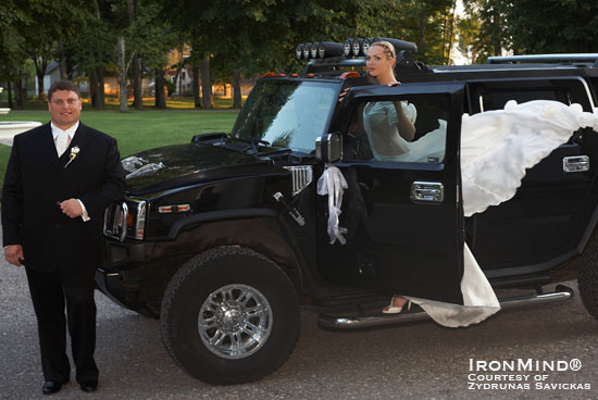 Zydrunas Savickas and his bride Jurgita make a Hummer look particularly good:  Zydrunas Savickas won a few Hummers at the Arnold strongman contest, but when he sent IronMind this photo yesterday with the caption “ wedding car :) ” we had to ask if this was one of them.  “I sold all Hummers,” Zydrunas said.  “I just used my friend’s Hummer for wedding.”  IronMind® | Photo courtesy of Zydrunas Savickas.