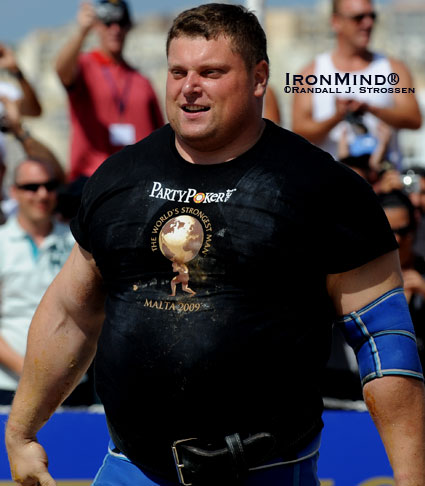 Zydrunas Savickas is a strongman who keeps his lip buttoned and lets his performances speak for themselves.  But don’t think quiet means docile:  This photo was taken seconds after Zydrunas realized he had won the 2009 World’s Strongest Man contest and there are teeth in that look.  IronMind® | Randall J. Strossen photo.