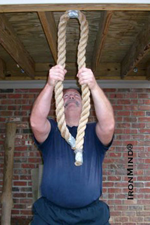 Start the rope grasp fairly high up on the rope - as you let go and re-grip you will slide down the rope a bit. IronMind® | Photo courtesy of John Brookfield.