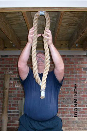 This exercise requires extreme focus and timing as you grip and re-grip the rope. IronMind® | Photo courtesy of John Brookfield.